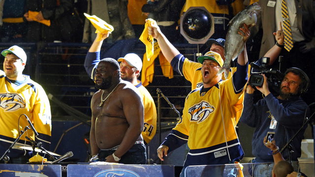 Watch: Titans' Lewan chucks catfish on ice during Predators' Game 6 win