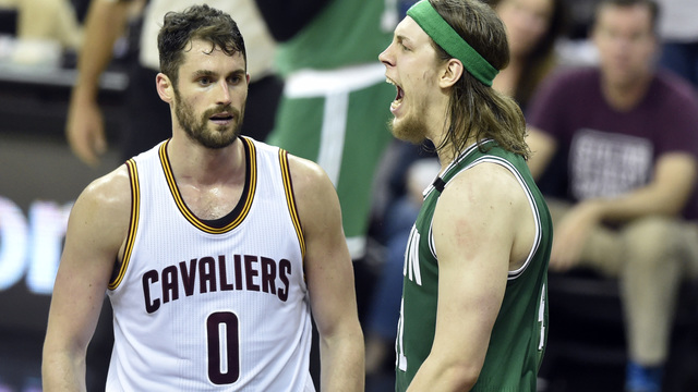 Watch: Olynyk throws down two-handed slam with Love wrapped around him