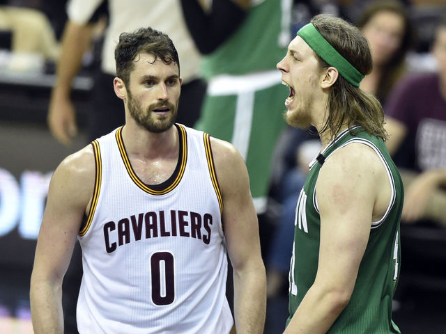 Watch: Olynyk throws down two-handed slam with Love wrapped around him