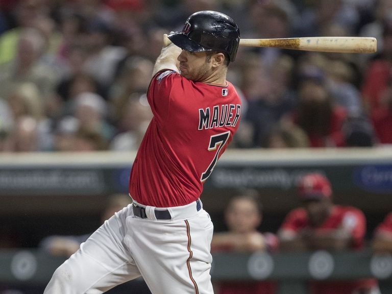 Mauer reaches base 7 times during MLB's longest game of season