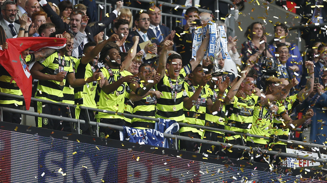 Huddersfield earns top-flight berth after beating Reading on spot-kicks