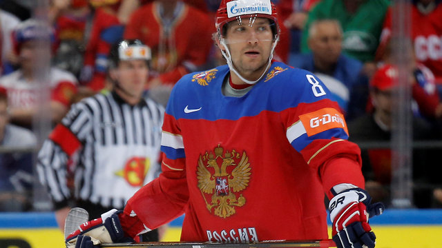 Bettman doesn't expect players under contract to defy Olympic decision