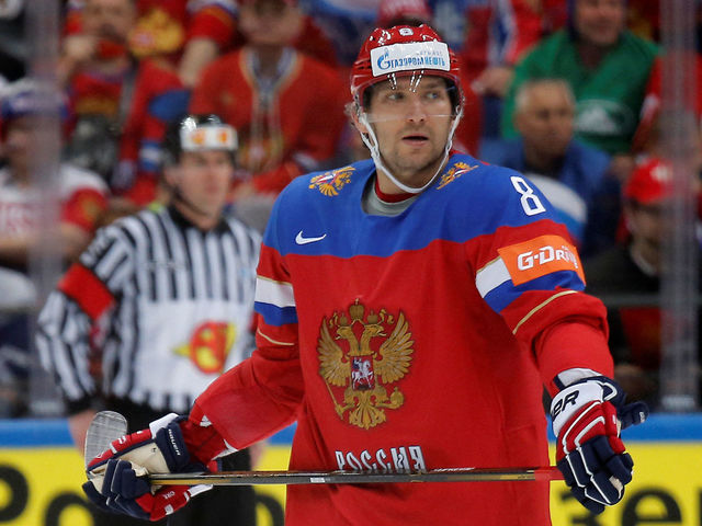 Bettman doesn't expect players under contract to defy Olympic decision