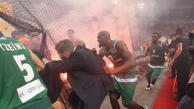 Watch: Fans toss flares during Greek basketball league title game