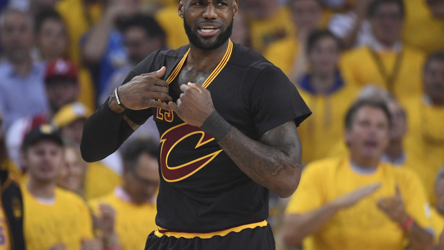LeBron day to day after turning left ankle