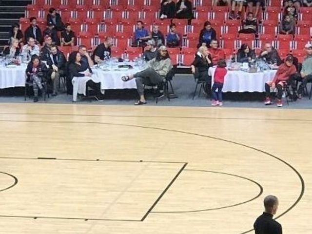 Adams takes in New Zealand league game from courtside dinner table