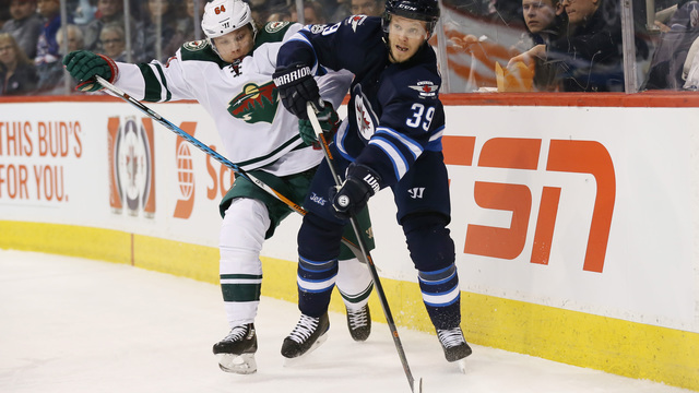 Jets' Enstrom waives no-movement clause