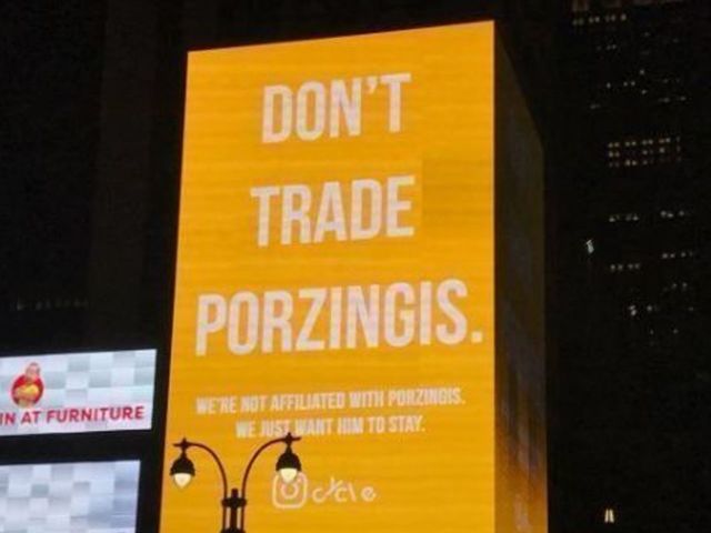 'Don't trade Porzingis' billboard lights up across from MSG on draft night