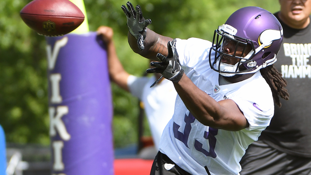 Vikings' Cook plays down notion he's replacing Peterson