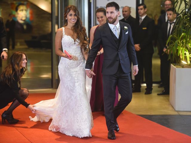 Messi marries childhood sweetheart Antonella in hometown of Rosario