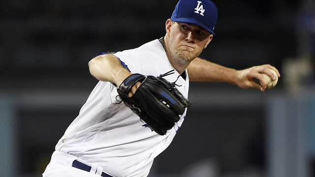 Wood joins Dodgers' record books with 10-0 start to season