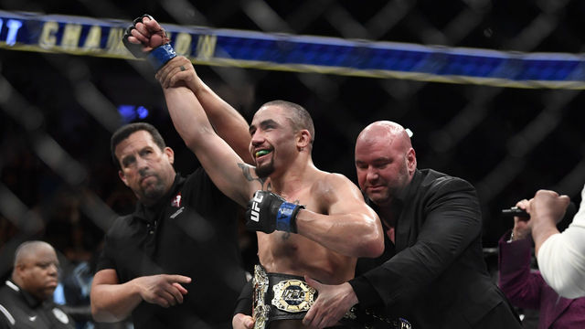 Whittaker guts out unanimous decision over Romero to win interim 185-lb title