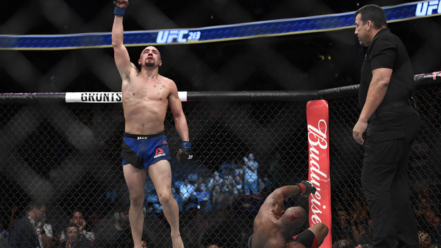 Whittaker beats Romero for interim title, Overeem edges Werdum at UFC 213