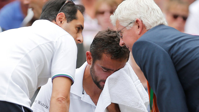 Watch: Cilic breaks down during 2nd-set changeover vs. Federer
