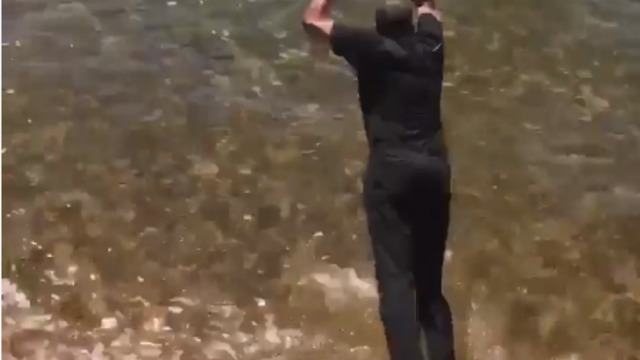 Watch: Dell Curry jumps in lake after losing father-son bet with Steph