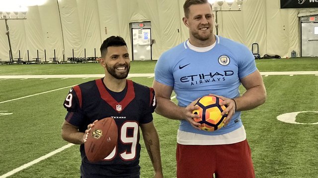 Watch: Watt tries on tiny Manchester City jersey