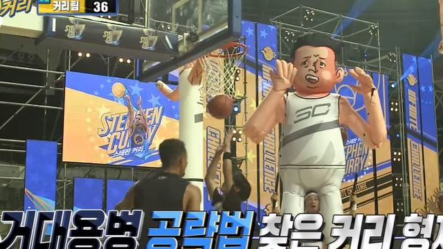 Watch: Curry drills half-court shot in bizarre basketball challenge