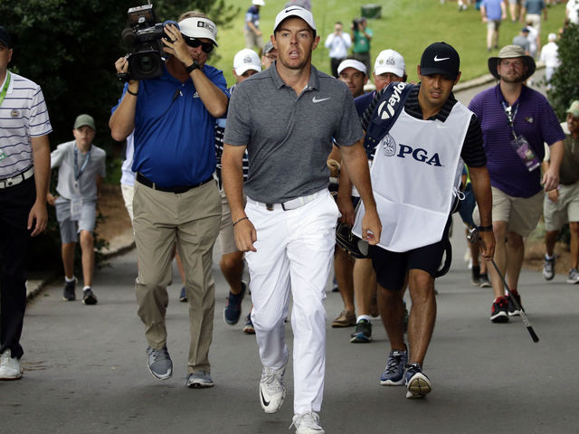 Watch: McIlroy skips ball off cart path, makes par at PGA