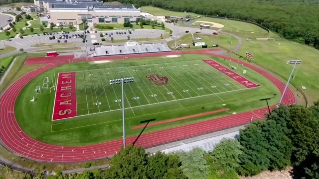 High school football player dies after hit in head by log during drill