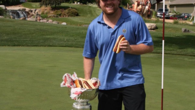 Kessel eats hot dogs out of the Stanley Cup