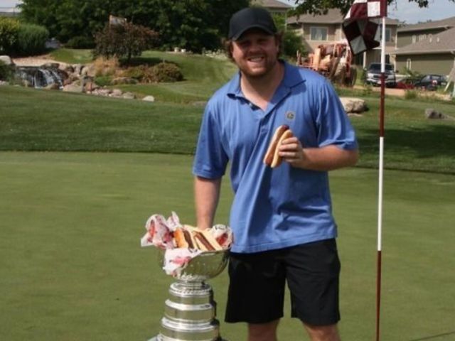 Kessel eats hot dogs out of the Stanley Cup
