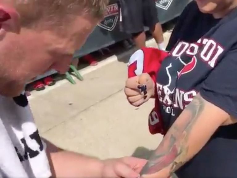 Watch: J.J. Watt signs fan's Watt tattoo | theScore.com