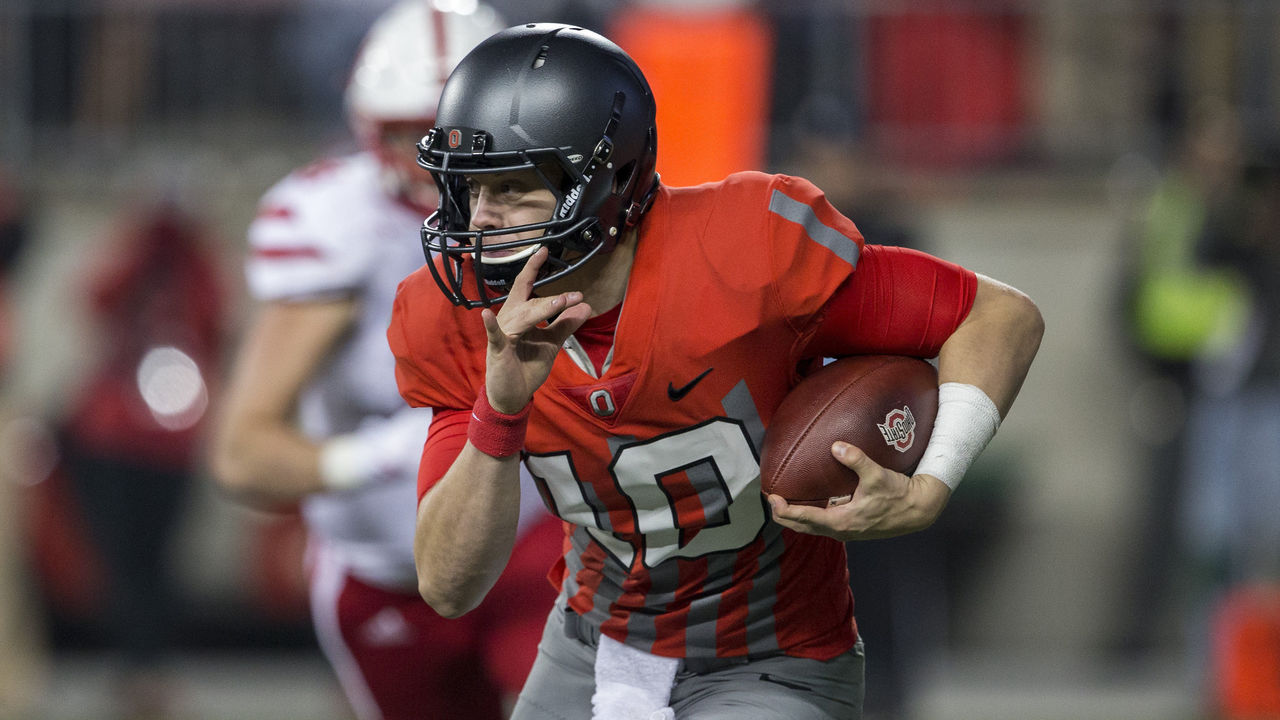 Ohio State quarterback Joe Burrow drops back to pass against Bowling Green  during the second half of an NCAA college football game Saturday, Sept. 3,  2016, in Columbus, Ohio. Ohio State beat