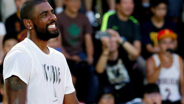 Look: Kyrie poses with 'Uncle Drew' cast