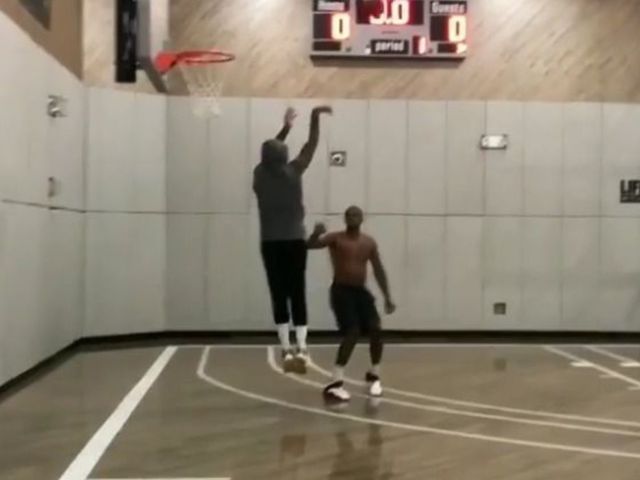 Watch: 'Hoodie Melo' surfaces in game with Booker, McCollum, J.R. Smith