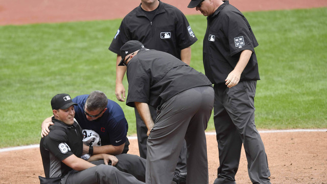MLB reviewing Tigers after umpire struck by stray pitch