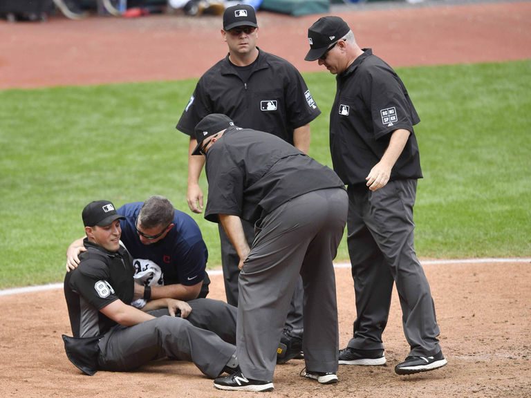 MLB reviewing Tigers after umpire struck by stray pitch