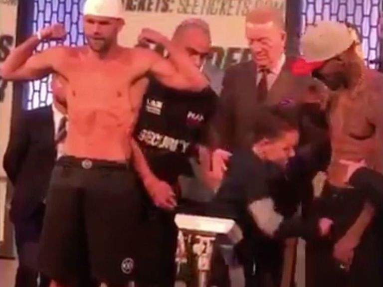 Watch Boxer's son punches opponent in groin during weighin