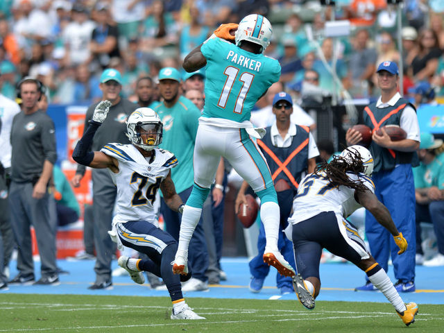 Watch: Dolphins' Parker skies to steal catch from Chargers corner