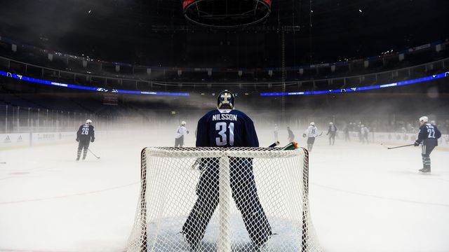 Canucks practice through heavy fog in Shanghai arena
