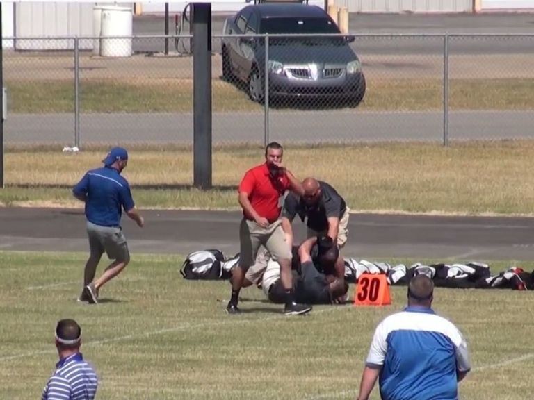 Watch 3rdgrade football coach puts colleague in chokehold