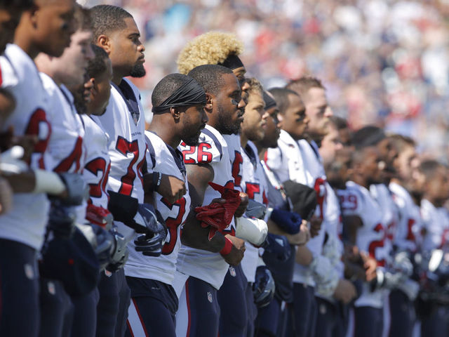 White House press secretary: NFL players should protest police, not flag