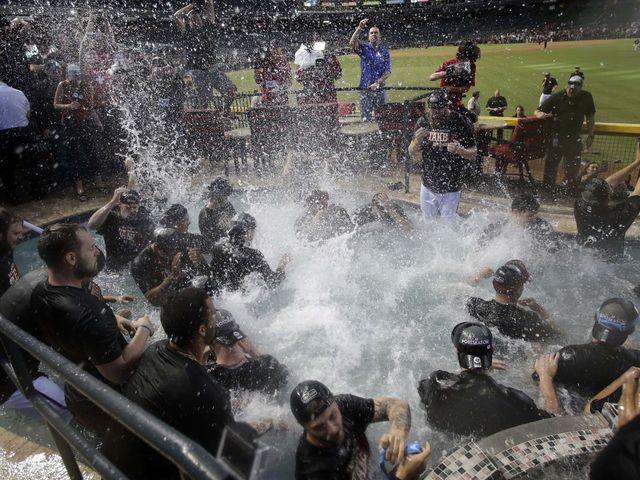 Watch: D-Backs celebrate postseason berth with impromptu po…