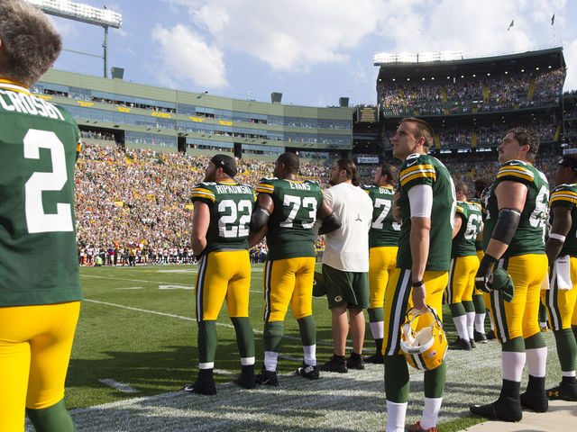 Rodgers says Packers will continue linking arms, asks fans to join