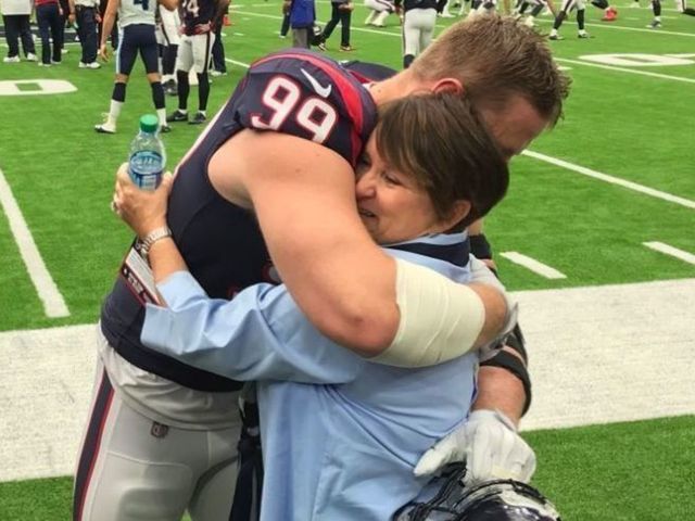 Watt hugs Titans owner for donation to Houston flood relief