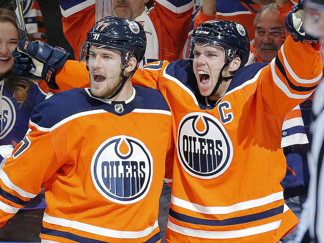 McDavid makes history with hat trick in season opener