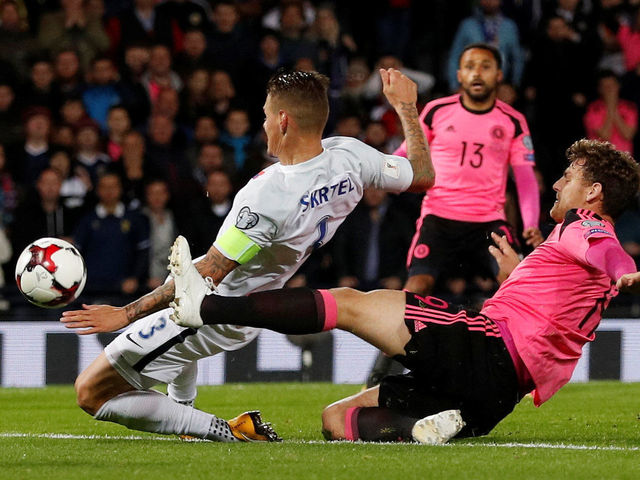 Scotland rescues late result with fortuitous Slovakia own goal