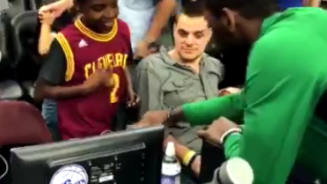 Watch: Kyrie Irving gives game-worn shoes to young fan