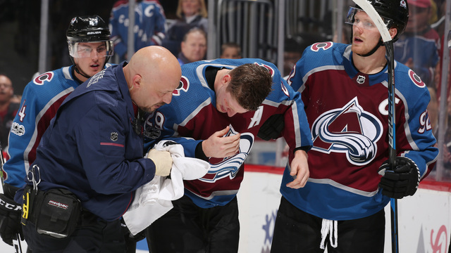 Avs' MacKinnon leaves game after taking stick to eye