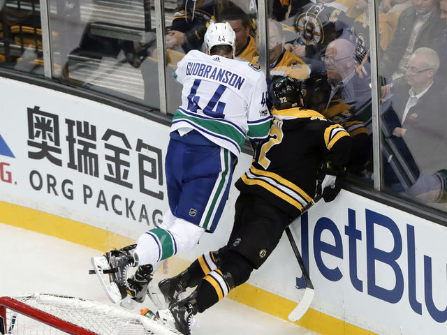Canucks' Gudbranson to have hearing for boarding Bruins' Vatrano