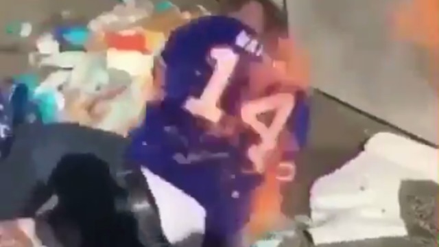 Watch: Bills fan sets himself on fire after jumping through burning table