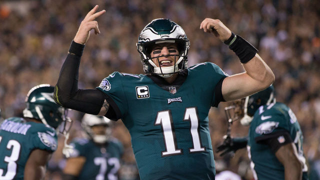Wentz tosses 4 TDs as Eagles beat Redskins, take NFL's top seed