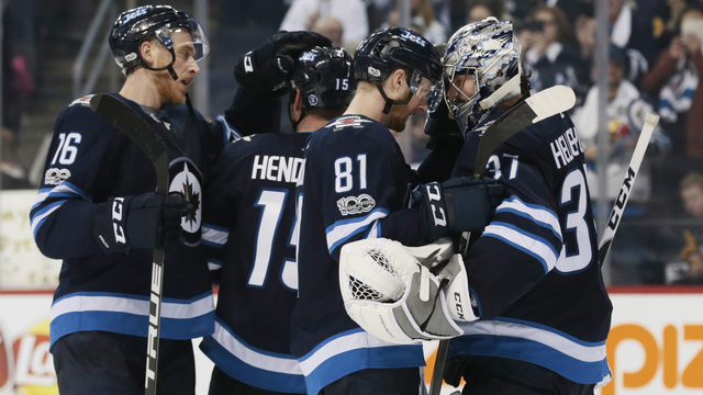 Wheeler's hat trick propels Jets to rout of Penguins