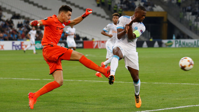 Evra issued red card before start of match for kicking fan