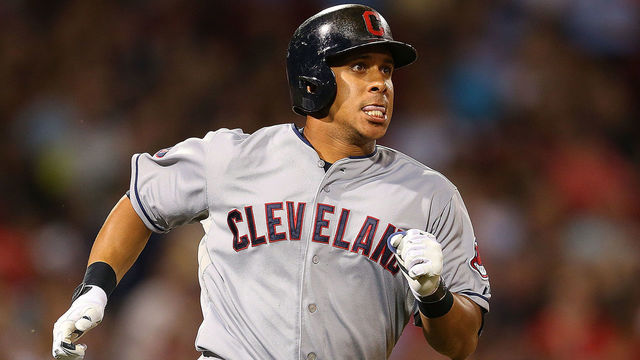 Indians exercise options on Brantley, Tomlin