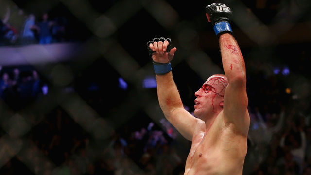 GSP chokes Bisping out, wins UFC middleweight title in return